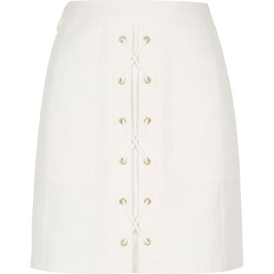 White textured lace-up mini skirt